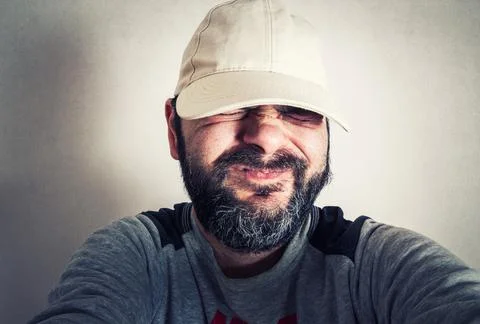 Funny man with the beard making expressions Stock Photos