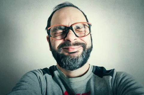 Funny man with the beard making expressions Stock-Fotos