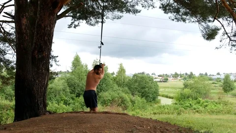 Funny man bungee jumping Stock Footage 113196076