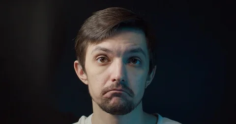 Funny man can't put on a glove Stock Footage 127634153