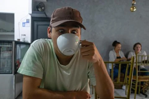 Funny man drinking coffee Stock-Fotos