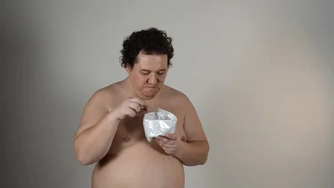 Funny man eating chips. Stock Footage 82378867