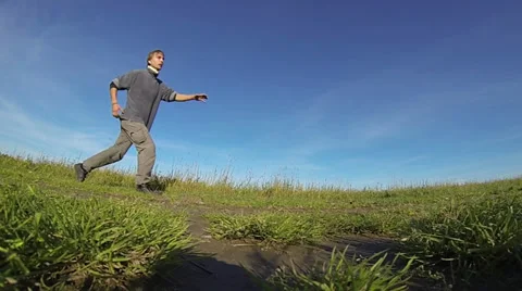 Funny man with gait of Bigfoot Stock Footage