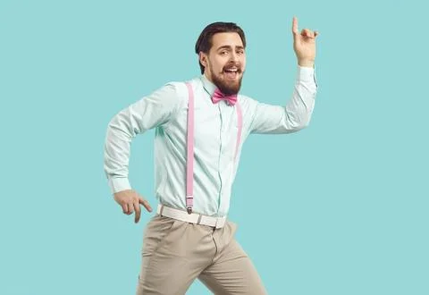 Funny man have fun dancing on studio background Foto stock