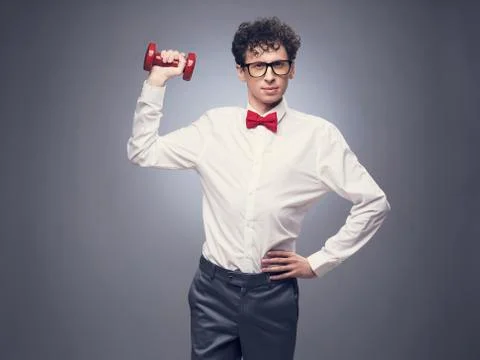 Funny man lifting weights Stock Photos