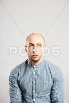 Funny man portrait real people high definition grey background Stock Photos