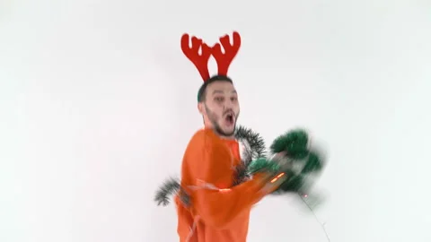 Funny man running in one place dressed in Christmas clothes Video stock 143638991