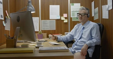 Funny messy office worker having a video call with no pants Stock Footage 308922958