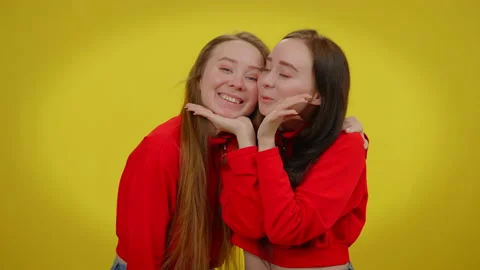 Sisters Kiss Stock Videos – Royalty-Free HD & 4K Videos