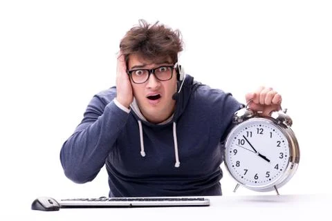 Funny nerd call center operator with giant clock Stock Photos
