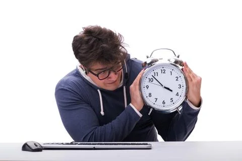 Funny nerd call center operator with giant clock Foto stock