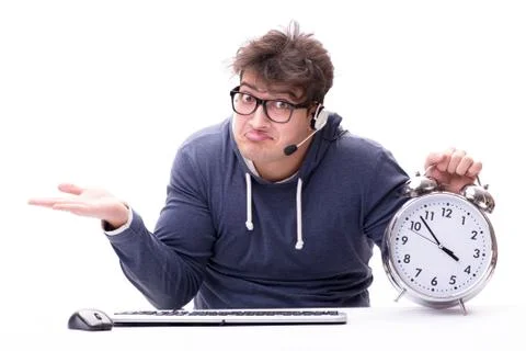 Funny nerd call center operator with giant clock Stock Photos