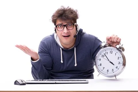 Funny nerd call center operator with giant clock Stock Photos