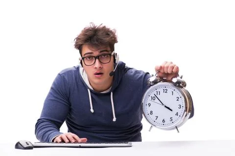 Funny nerd call center operator with giant clock Stock Photos