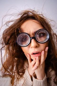 The funny nerd girl working on computer Stock Photos