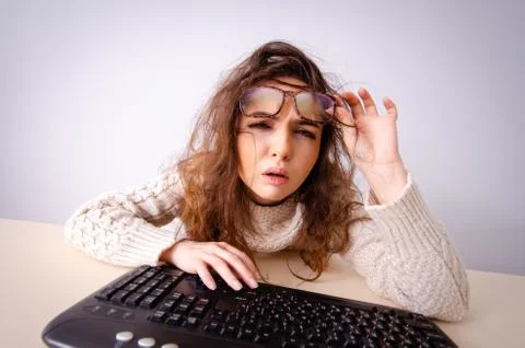 Funny nerd girl working on computer 스톡 사진