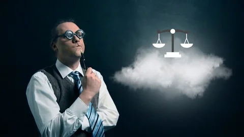 Funny nerd or geek looking to flying cloud with rotating justice icon Stock Footage 104257066