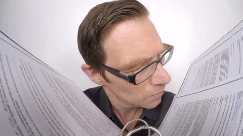 Funny office worker reading documents Stock Footage 210522108