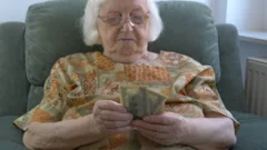 Funny old lady is counting money. Rich e... | Stock Video | Pond5