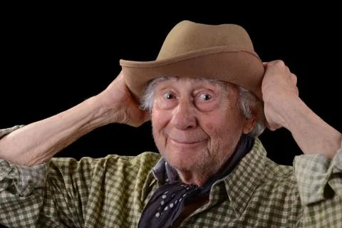 Funny old man in a hat Fotos Stock