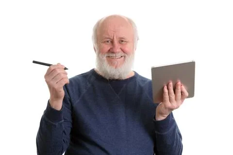 Funny old man using tablet computer isolated on white Stock-Fotos