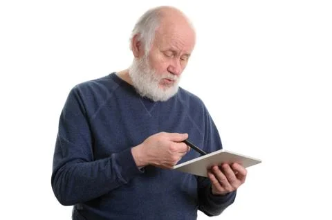 Funny old man using tablet computer isolated on white Stock Photos