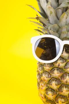Funny pineapple in a sunglasses Stock Photos