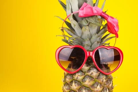 Funny pineapple in a sunglasses Stock Photos