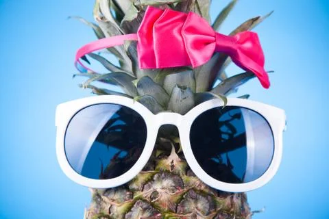 Funny pineapple in a sunglasses Stock Photos