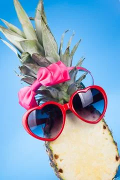 Funny pineapple in a sunglasses Stock Photos