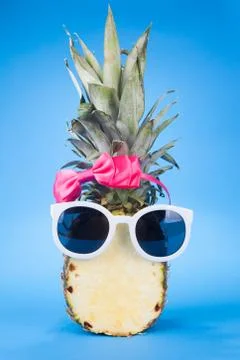 Funny pineapple in a sunglasses Stock Photos