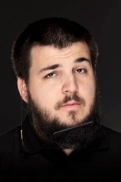 Funny portrait, guy with comb in beard. Stock Photos