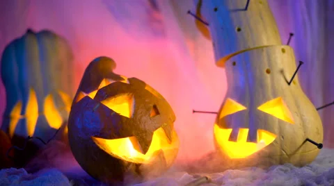 Funny pumpkin head the company during the night Halloween. sinister composition Stock Footage