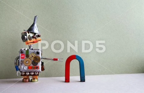 Funny robot red blue horseshoe magnet. Creative design toy funnel hopper, cogs Stock Photos