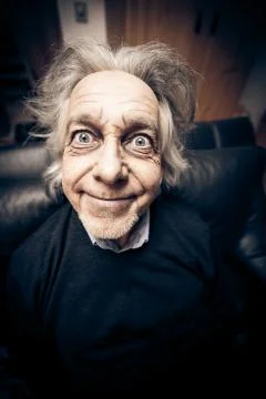 Funny Senior Man Making Faces Фото