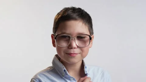 Funny smiling boy with glasses Stock Footage 239625242