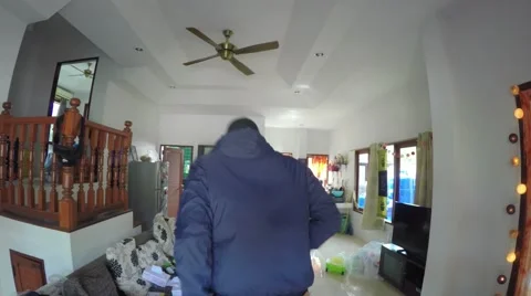 Funny Thief Dancing in Front Of Camera in Robbed House Stock-Footage 67485246