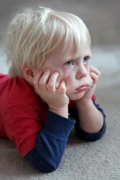 Funny Toddler Child Looking Grumpy or Pouting Stock Photos