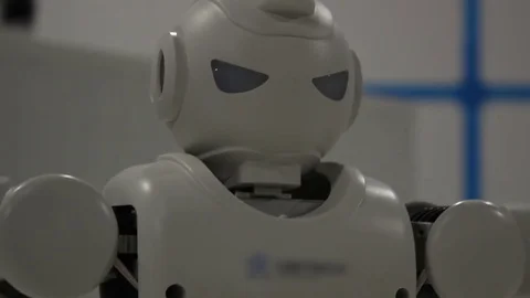 Funny white dancing robot close look Stock Footage 71936631
