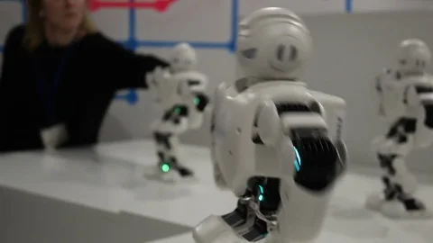 Funny white dancing robots Stock Footage 71936871