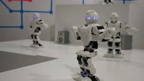 Funny white dancing robots Stock Footage 71937007