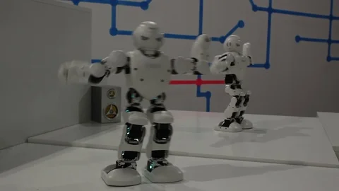 Funny white dancing robots Stock Footage 71937571