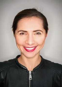 Funny wide angle close up ring light portrait of young woman smiling happily Stock Photos
