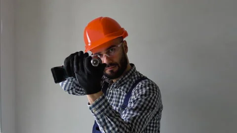 Funny window installer with screwdriver ... | Stock Video | Pond5