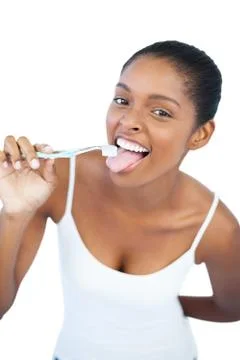 Funny woman brushing her tongue with toothbrush Stock Photos