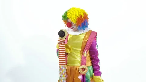 Funny young clown playing with puppet Stock-Footage 70286093