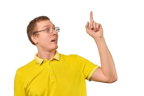 Funny young guy in corrective glasses and yellow T-shirt with eureka gesture, Stock Photos