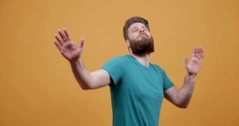 Funny young man with a nice beard dances disco Stock Footage 104283917