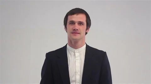 Funny young man winks Stock-Footage 68759970