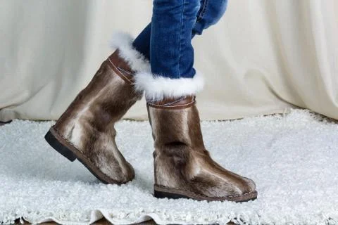 Fur boots side view Stock Photos